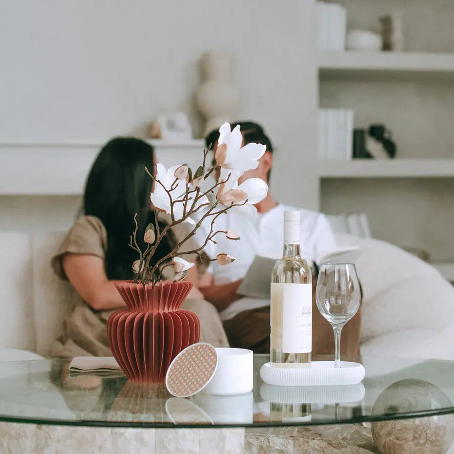 Terra Cotta Maia sculptural vase stylized on a glass top, modern Japandi minimalist ribbed fluted home decor by Sonnihaus